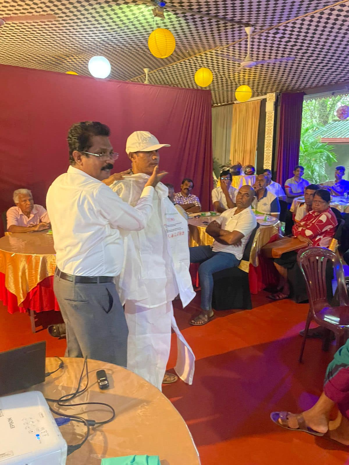 A trainer from Hayleys Agriculture Training School (HATS) conducting a training programme.